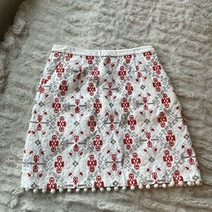 Anthropologie Cream pencil skirt with Dark Orange and Taupe/Olive Embroidery